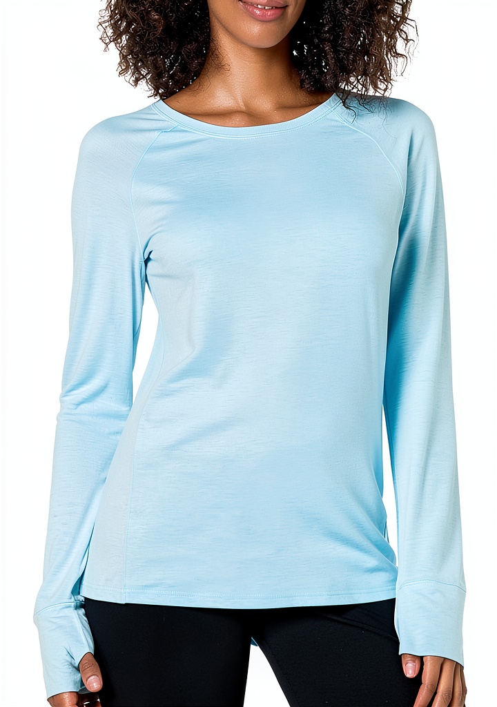 Woman wearing Amazon Essentials long sleeve workout top during a yoga session